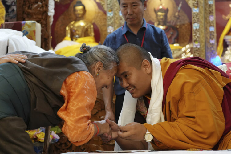 Today he is a high school football player. Soon he'll be a Buddhist lama in the Himalayas.